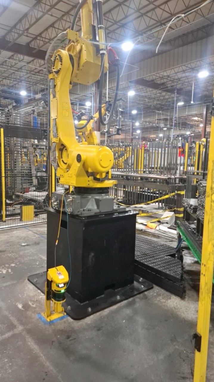 Robot on a pedestal with a safety laser scanner